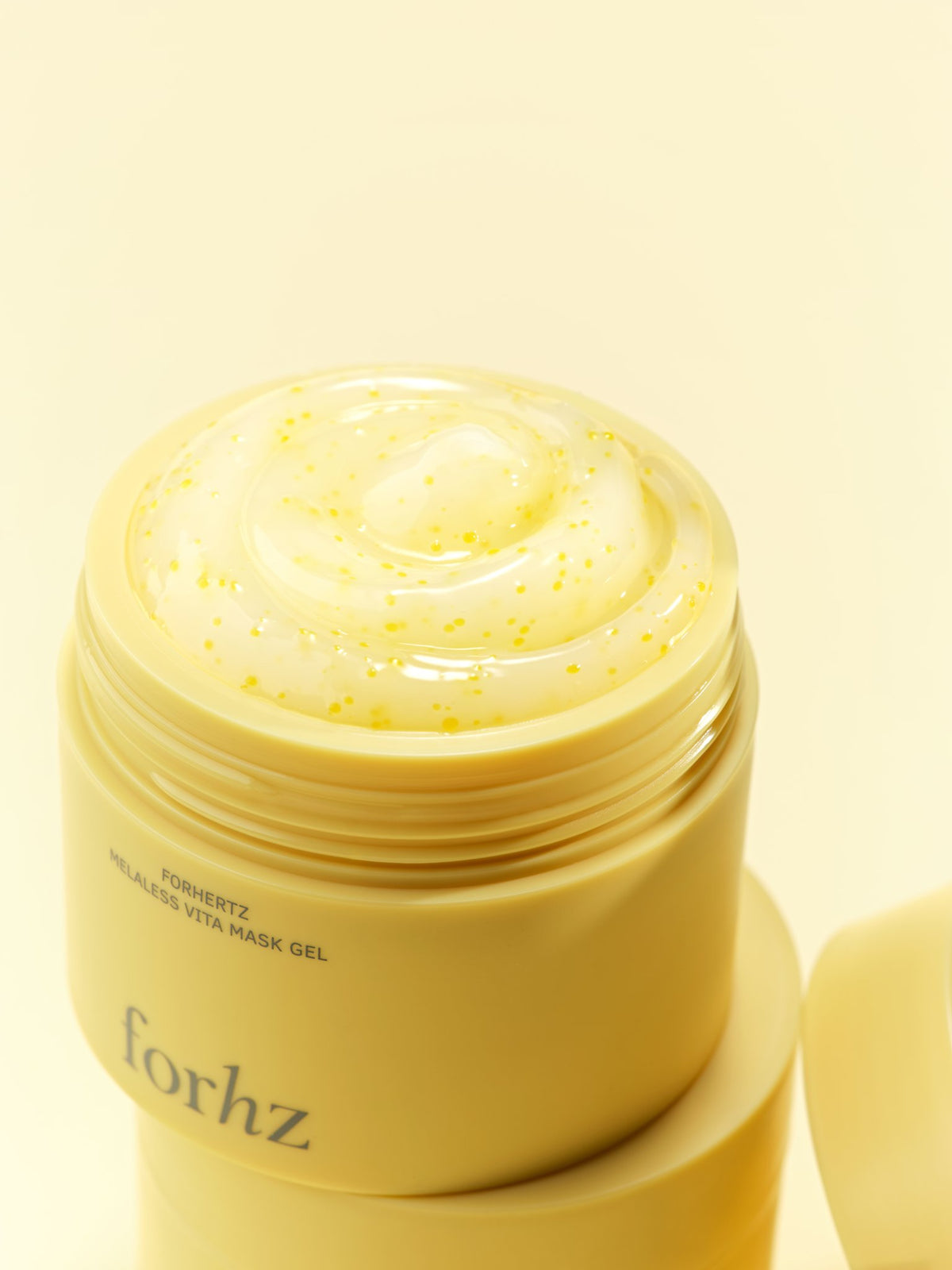 Bouncy jelly texture of FORHERTZ Vita Mask Gel with golden capsules